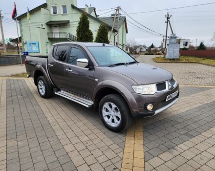 Коричневый Мицубиси Л 200, объемом двигателя 2.5 л и пробегом 159 тыс. км за 8398 $, фото 1 на Automoto.ua