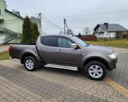 Коричневый Мицубиси Л 200, объемом двигателя 2.5 л и пробегом 159 тыс. км за 8398 $, фото 3 на Automoto.ua