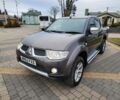 Коричневый Мицубиси Л 200, объемом двигателя 2.5 л и пробегом 159 тыс. км за 8398 $, фото 5 на Automoto.ua