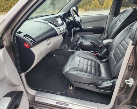 Коричневый Мицубиси Л 200, объемом двигателя 2.5 л и пробегом 159 тыс. км за 8398 $, фото 15 на Automoto.ua