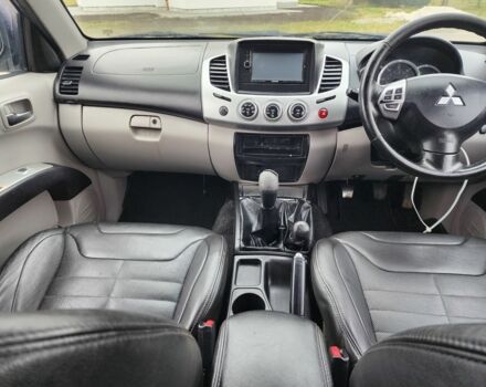 Коричневый Мицубиси Л 200, объемом двигателя 2.5 л и пробегом 159 тыс. км за 8398 $, фото 21 на Automoto.ua