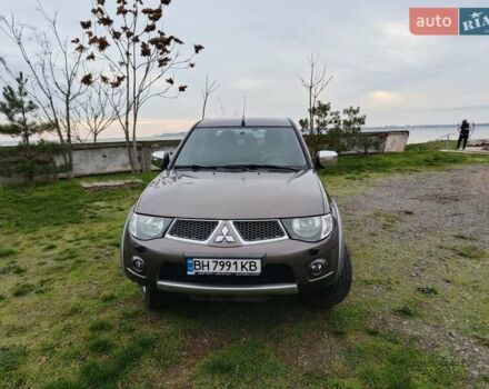 Коричневый Мицубиси Л 200, объемом двигателя 2.48 л и пробегом 251 тыс. км за 15500 $, фото 1 на Automoto.ua