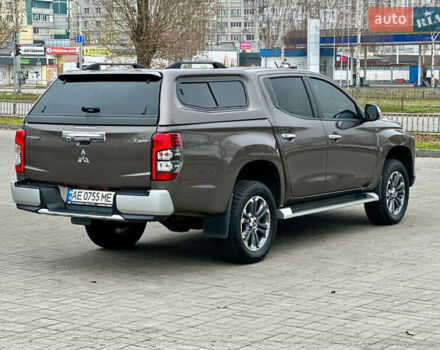 Коричневий Міцубісі Л 200, об'ємом двигуна 2.44 л та пробігом 107 тис. км за 29999 $, фото 1 на Automoto.ua