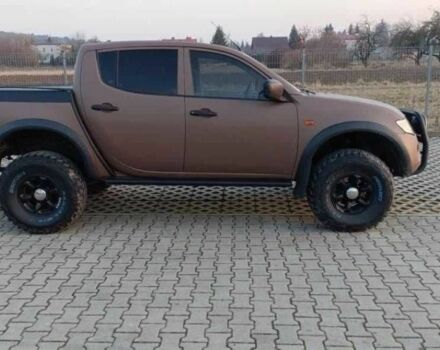 Коричневый Мицубиси Л 200, объемом двигателя 2.5 л и пробегом 273 тыс. км за 4200 $, фото 2 на Automoto.ua