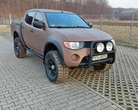 Коричневый Мицубиси Л 200, объемом двигателя 2.5 л и пробегом 298 тыс. км за 3250 $, фото 1 на Automoto.ua