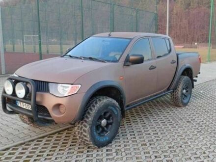 Коричневый Мицубиси Л 200, объемом двигателя 2.5 л и пробегом 273 тыс. км за 4200 $, фото 1 на Automoto.ua