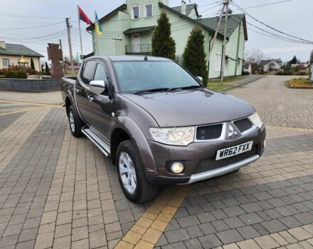 Коричневий Міцубісі Л 200, об'ємом двигуна 2.5 л та пробігом 159 тис. км за 8398 $, фото 1 на Automoto.ua