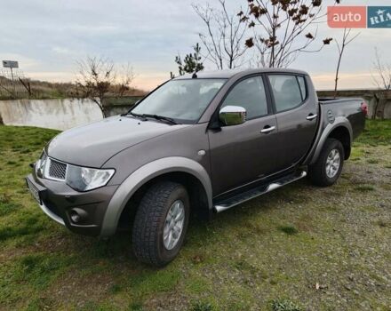 Коричневий Міцубісі Л 200, об'ємом двигуна 2.48 л та пробігом 251 тис. км за 15500 $, фото 1 на Automoto.ua