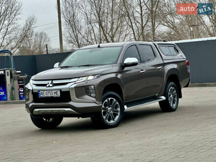 Коричневий Міцубісі Л 200, об'ємом двигуна 2.44 л та пробігом 107 тис. км за 29999 $, фото 1 на Automoto.ua