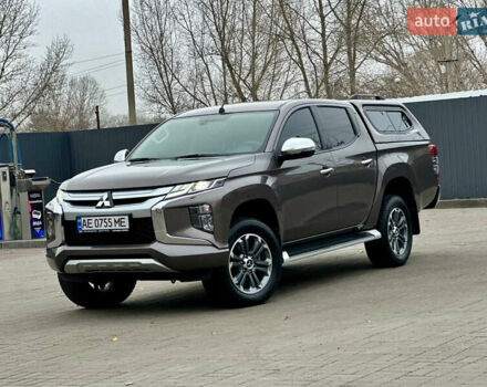 Коричневий Міцубісі Л 200, об'ємом двигуна 2.44 л та пробігом 107 тис. км за 29999 $, фото 1 на Automoto.ua