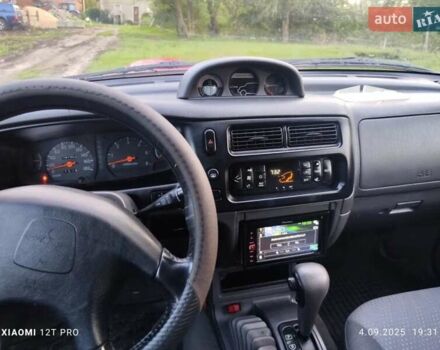 Красный Мицубиси Л 200, объемом двигателя 2.5 л и пробегом 272 тыс. км за 3200 $, фото 5 на Automoto.ua