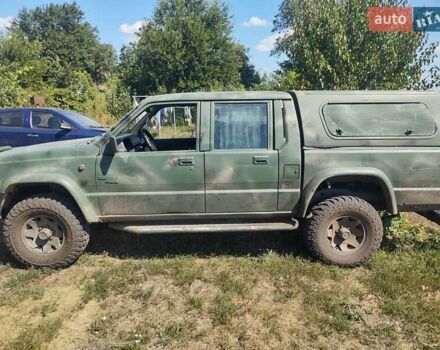 Красный Мицубиси Л 200, объемом двигателя 2.5 л и пробегом 400 тыс. км за 4700 $, фото 10 на Automoto.ua