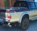 Красный Мицубиси Л 200, объемом двигателя 2.5 л и пробегом 230 тыс. км за 2100 $, фото 4 на Automoto.ua