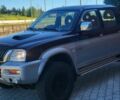 Красный Мицубиси Л 200, объемом двигателя 2.5 л и пробегом 250 тыс. км за 2000 $, фото 3 на Automoto.ua