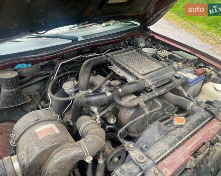 Мицубиси Л 200 2005 в Николаеве на Automoto.ua Красный Мицубиси Л 200, объемом двигателя 2.5 л и пробегом 200 тыс. км за 10140 $, фото 13 на Automoto.ua