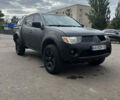 Красный Мицубиси Л 200, объемом двигателя 2.48 л и пробегом 270 тыс. км за 11000 $, фото 1 на Automoto.ua