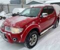Красный Мицубиси Л 200, объемом двигателя 2.5 л и пробегом 119 тыс. км за 7500 $, фото 1 на Automoto.ua