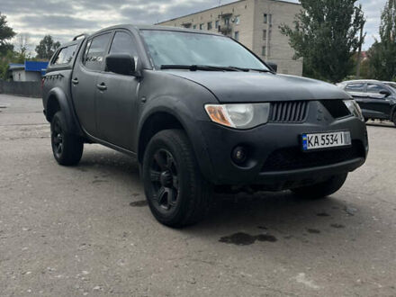 Красный Мицубиси Л 200, объемом двигателя 2.48 л и пробегом 270 тыс. км за 11000 $, фото 1 на Automoto.ua