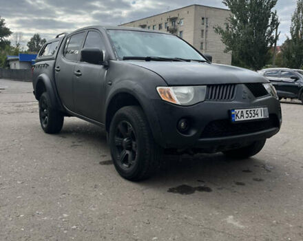 Червоний Міцубісі Л 200, об'ємом двигуна 2.48 л та пробігом 270 тис. км за 11000 $, фото 1 на Automoto.ua