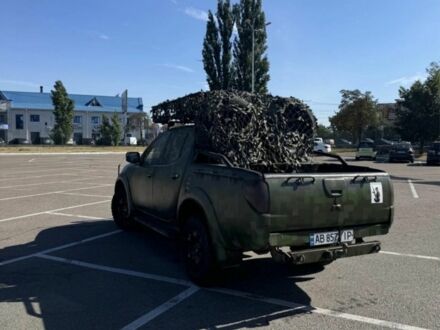Мицубиси Л 200 2007 в Житомире на Automoto.ua Красный Мицубиси Л 200, объемом двигателя 2.5 л и пробегом 212 тыс. км за 13500 $, фото 1 на Automoto.ua