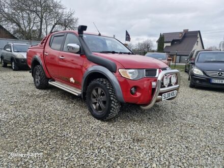 Красный Мицубиси Л 200, объемом двигателя 0 л и пробегом 126 тыс. км за 6955 $, фото 1 на Automoto.ua