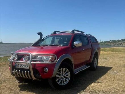 Мицубиси Л 200 2008 в Николаеве на Automoto.ua Красный Мицубиси Л 200, объемом двигателя 2.48 л и пробегом 319 тыс. км за 11500 $, фото 1 на Automoto.ua