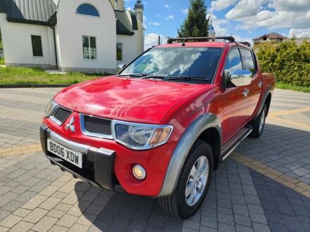 Мицубиси Л 200 2009 в Львове на Automoto.ua Красный Мицубиси Л 200, объемом двигателя 2.5 л и пробегом 176 тыс. км за 7757 $, фото 1 на Automoto.ua