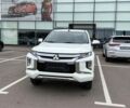 купить новое авто Мицубиси Л 200 2024 года от официального дилера Mitsubishi Арма Моторс Мицубиси фото