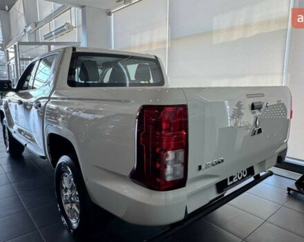 купить новое авто Мицубиси Л 200 2025 года от официального дилера Mitsubishi Арма Моторс Мицубиси фото