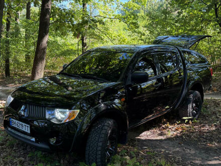 Мицубиси Л 200, объемом двигателя 2.5 л и пробегом 180 тыс. км за 13300 $, фото 1 на Automoto.ua