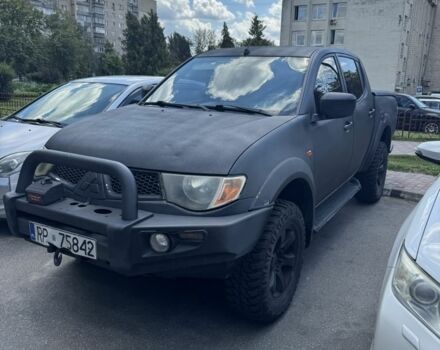 Мицубиси Л 200, объемом двигателя 2.5 л и пробегом 230 тыс. км за 9000 $, фото 1 на Automoto.ua
