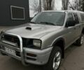 Серый Мицубиси Л 200, объемом двигателя 2.5 л и пробегом 673 тыс. км за 4500 $, фото 1 на Automoto.ua