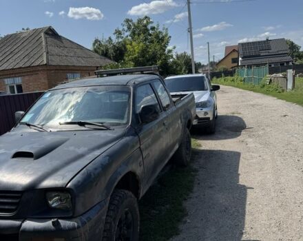 Серый Мицубиси Л 200, объемом двигателя 2.5 л и пробегом 290 тыс. км за 3100 $, фото 3 на Automoto.ua