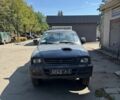 Серый Мицубиси Л 200, объемом двигателя 2.5 л и пробегом 290 тыс. км за 3100 $, фото 2 на Automoto.ua