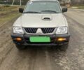 Сірий Міцубісі Л 200, об'ємом двигуна 2.5 л та пробігом 300 тис. км за 5500 $, фото 1 на Automoto.ua