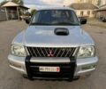 Серый Мицубиси Л 200, объемом двигателя 2.5 л и пробегом 213 тыс. км за 4800 $, фото 2 на Automoto.ua