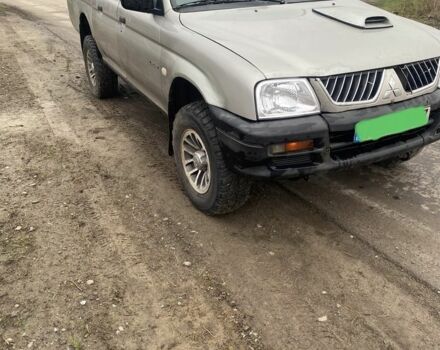 Сірий Міцубісі Л 200, об'ємом двигуна 2.5 л та пробігом 300 тис. км за 5500 $, фото 8 на Automoto.ua