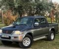 Серый Мицубиси Л 200, объемом двигателя 2.5 л и пробегом 200 тыс. км за 5311 $, фото 1 на Automoto.ua
