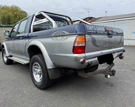 Серый Мицубиси Л 200, объемом двигателя 2.5 л и пробегом 180 тыс. км за 6200 $, фото 5 на Automoto.ua