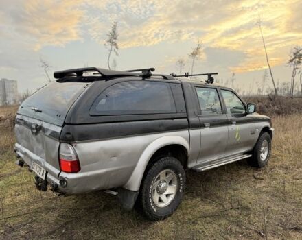 Серый Мицубиси Л 200, объемом двигателя 2.5 л и пробегом 258 тыс. км за 4500 $, фото 3 на Automoto.ua