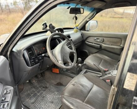 Серый Мицубиси Л 200, объемом двигателя 2.5 л и пробегом 258 тыс. км за 4500 $, фото 5 на Automoto.ua