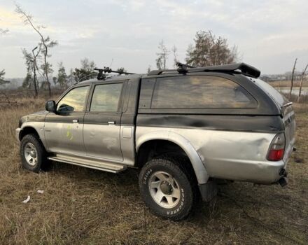 Серый Мицубиси Л 200, объемом двигателя 2.5 л и пробегом 258 тыс. км за 4500 $, фото 4 на Automoto.ua