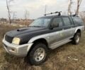 Серый Мицубиси Л 200, объемом двигателя 2.5 л и пробегом 258 тыс. км за 4500 $, фото 1 на Automoto.ua