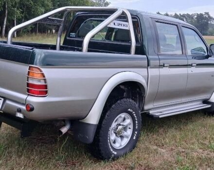 Серый Мицубиси Л 200, объемом двигателя 2.5 л и пробегом 224 тыс. км за 2550 $, фото 6 на Automoto.ua