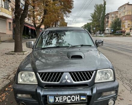 Серый Мицубиси Л 200, объемом двигателя 2.5 л и пробегом 280 тыс. км за 3500 $, фото 4 на Automoto.ua