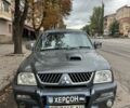 Серый Мицубиси Л 200, объемом двигателя 2.5 л и пробегом 280 тыс. км за 3500 $, фото 4 на Automoto.ua