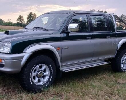 Серый Мицубиси Л 200, объемом двигателя 2.5 л и пробегом 219 тыс. км за 2650 $, фото 3 на Automoto.ua