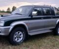 Серый Мицубиси Л 200, объемом двигателя 2.5 л и пробегом 219 тыс. км за 2650 $, фото 3 на Automoto.ua