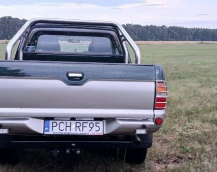 Серый Мицубиси Л 200, объемом двигателя 2.5 л и пробегом 219 тыс. км за 2650 $, фото 8 на Automoto.ua