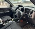 Серый Мицубиси Л 200, объемом двигателя 2.5 л и пробегом 280 тыс. км за 3500 $, фото 2 на Automoto.ua